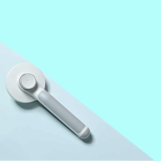Pet Massage Comb With an Ergonomically Designed Round Handle